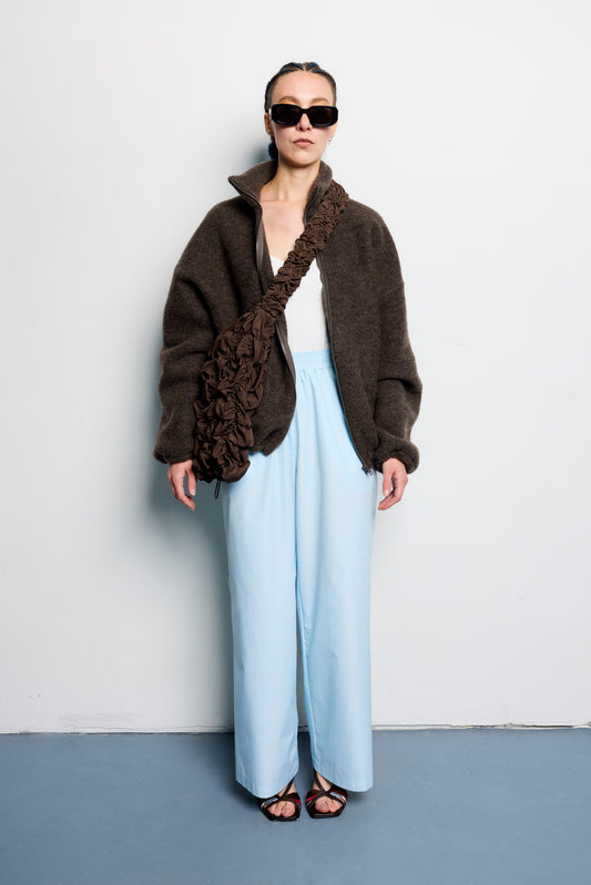 Брюки з плащівки